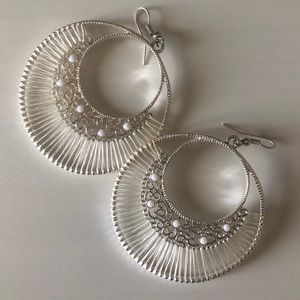 Stylish earrings with beaded design